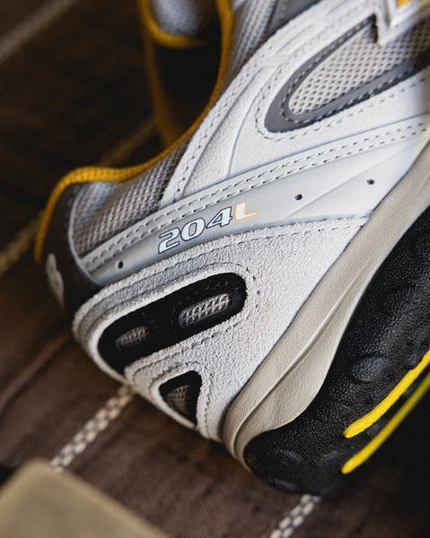 Оригінальні кросівки New Balance 204L "Raincloud / Baroque Gold" (U204LNPB) U204LNPB фото